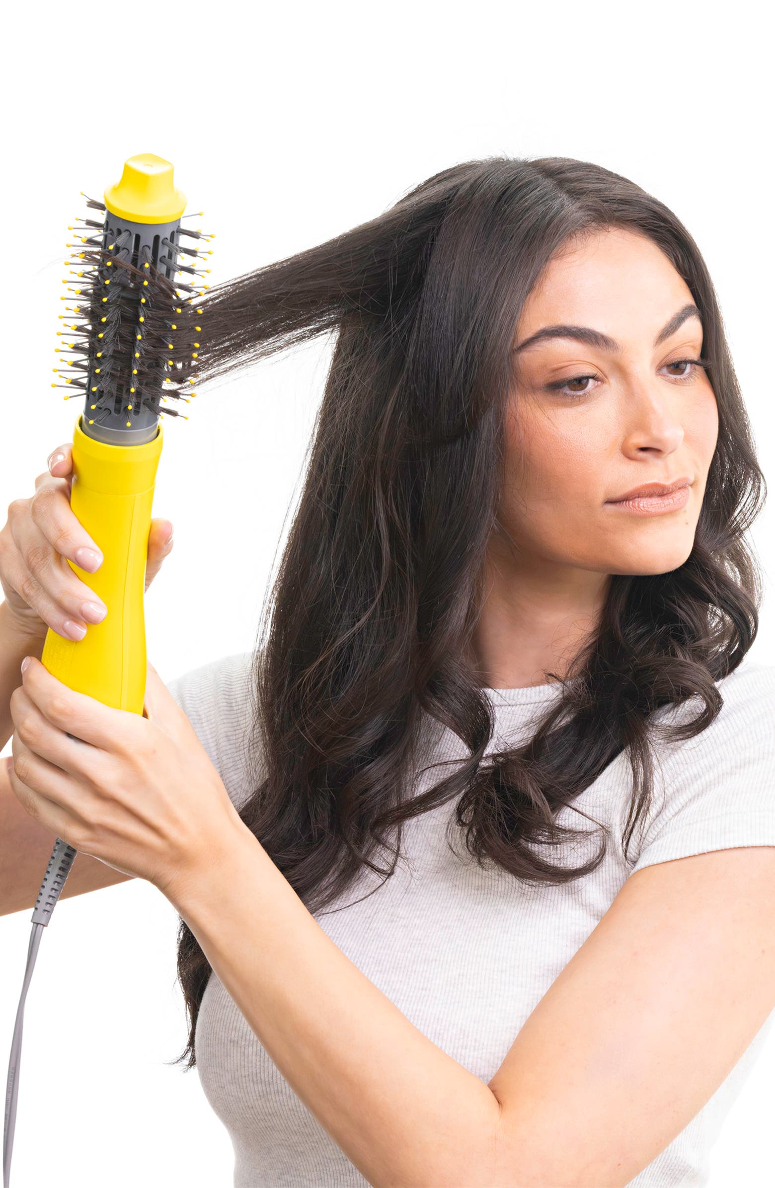 The Triple Shot Interchangeable Blow-Dryer Brush